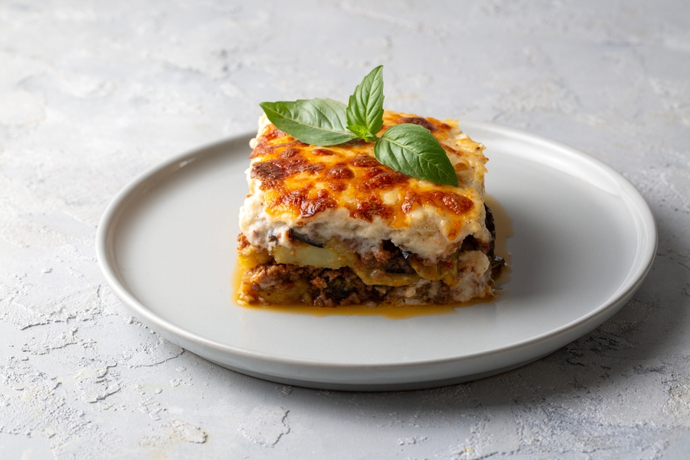 A layered casserole with some beautiful layors with beef being the main filling.