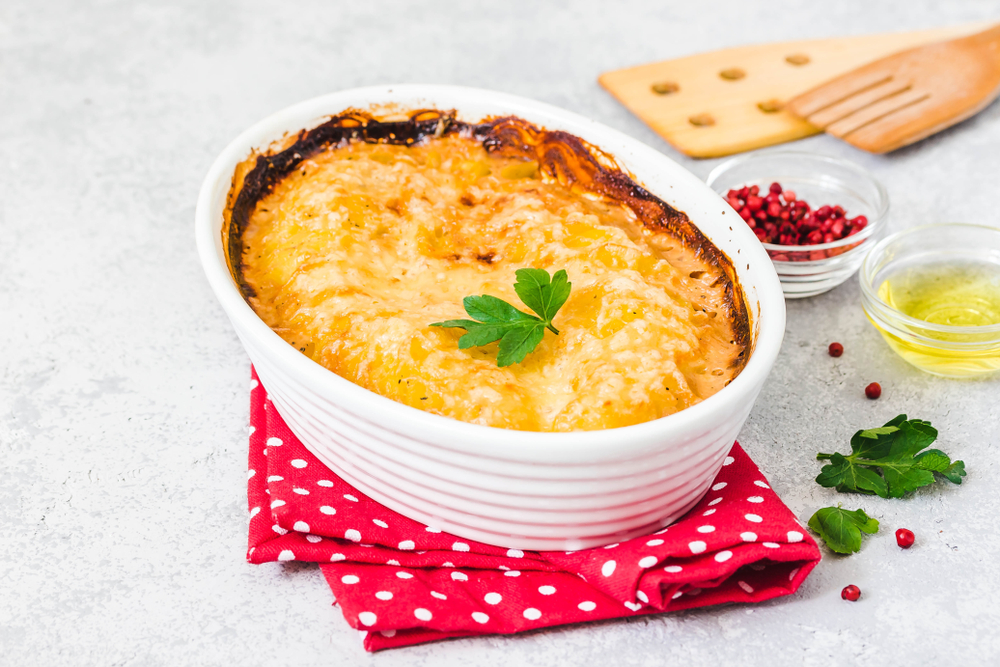 A freshly baked cheesy potato side to be eaten with any main dish. Read to be served.