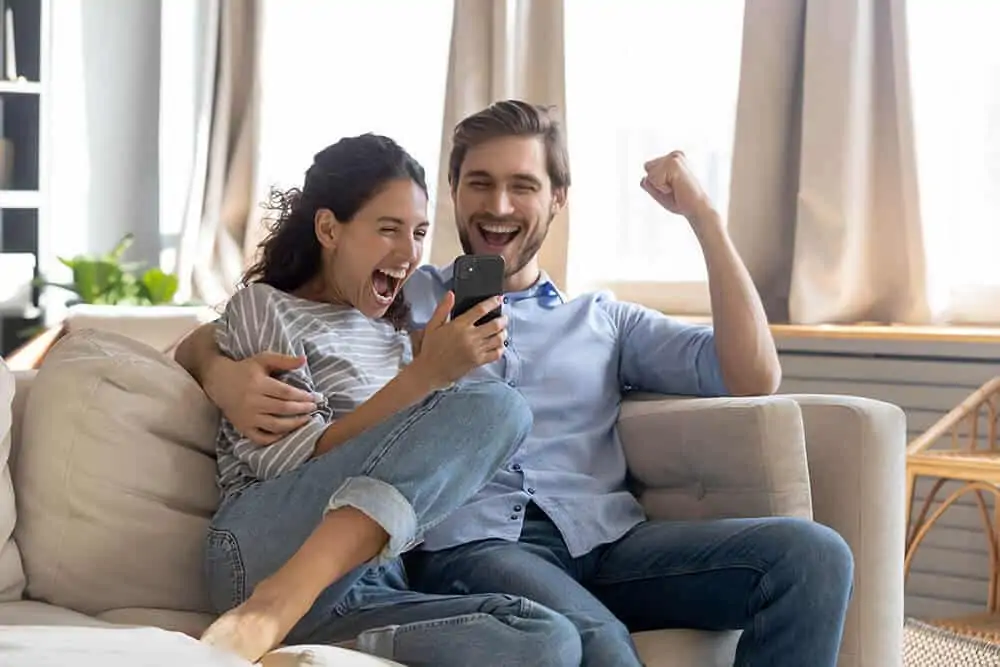 Happy couple after getting loans without credit check