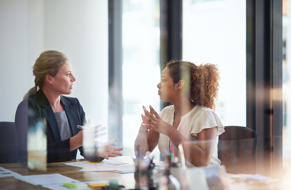 Two women discussing options after rejection from loan | Swoosh Finance