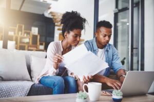 Couple organising their finances after one losing a job