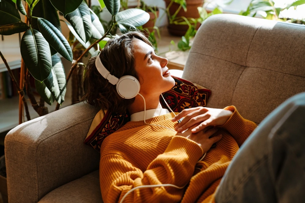 Woman listening to a customised playlist from her partner