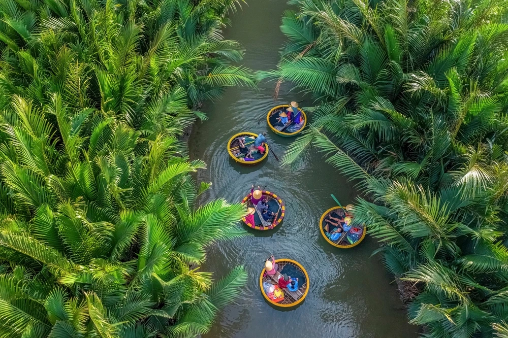 Boats in Thailand in narrow river