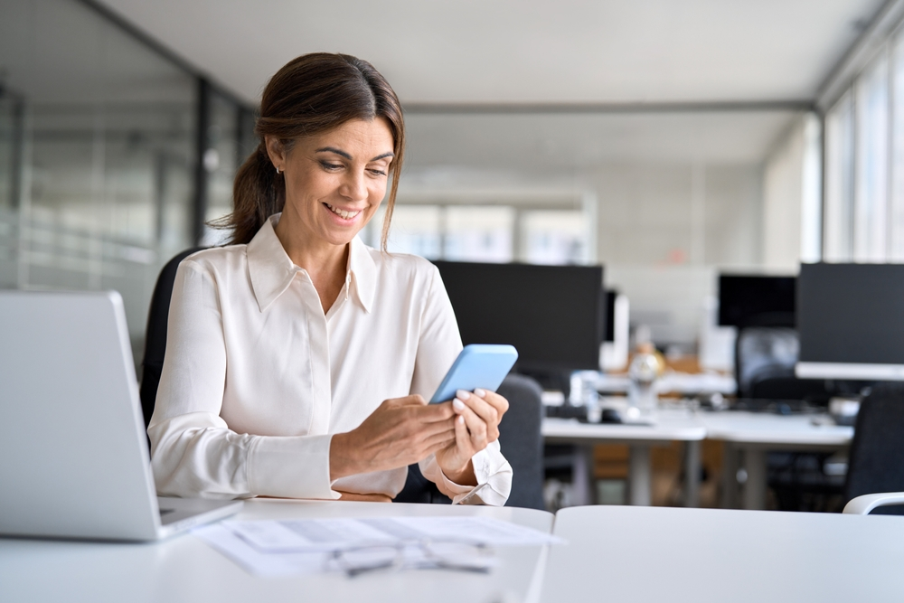 Middle aged proffessional women planning her loan application | Swoosh Finance