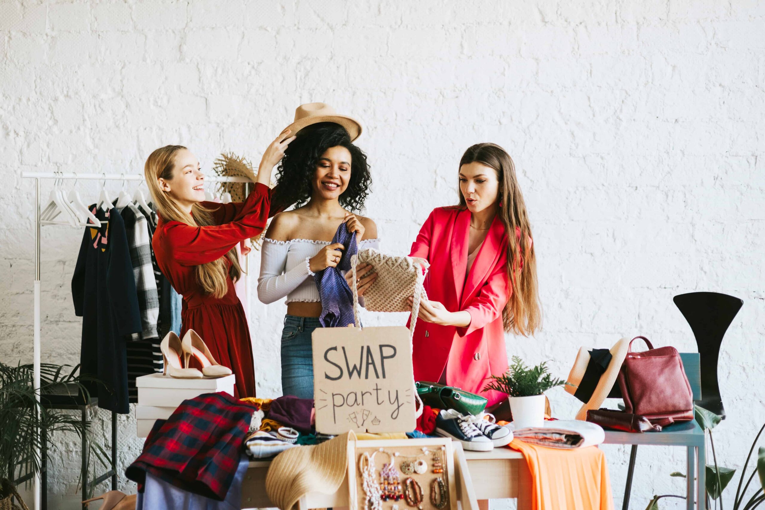 3 girls swapping clothes to save cash