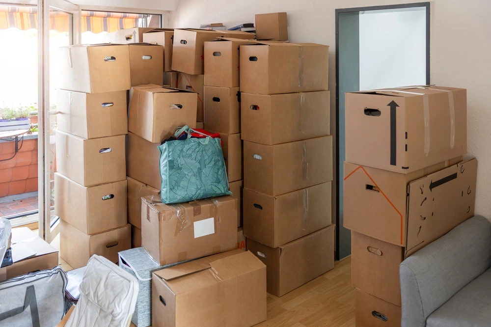 A room full of boxes in a hired out space.